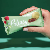 idealne połączenie zielonej herbaty matcha i malin w organicznych pralinkach Lini’s Bites! Bio, wegańskie, bezglutenowe i bez dodatku cukru – Matcha Raspberry Pralinis to przekąska, której nie sposób się oprzeć.